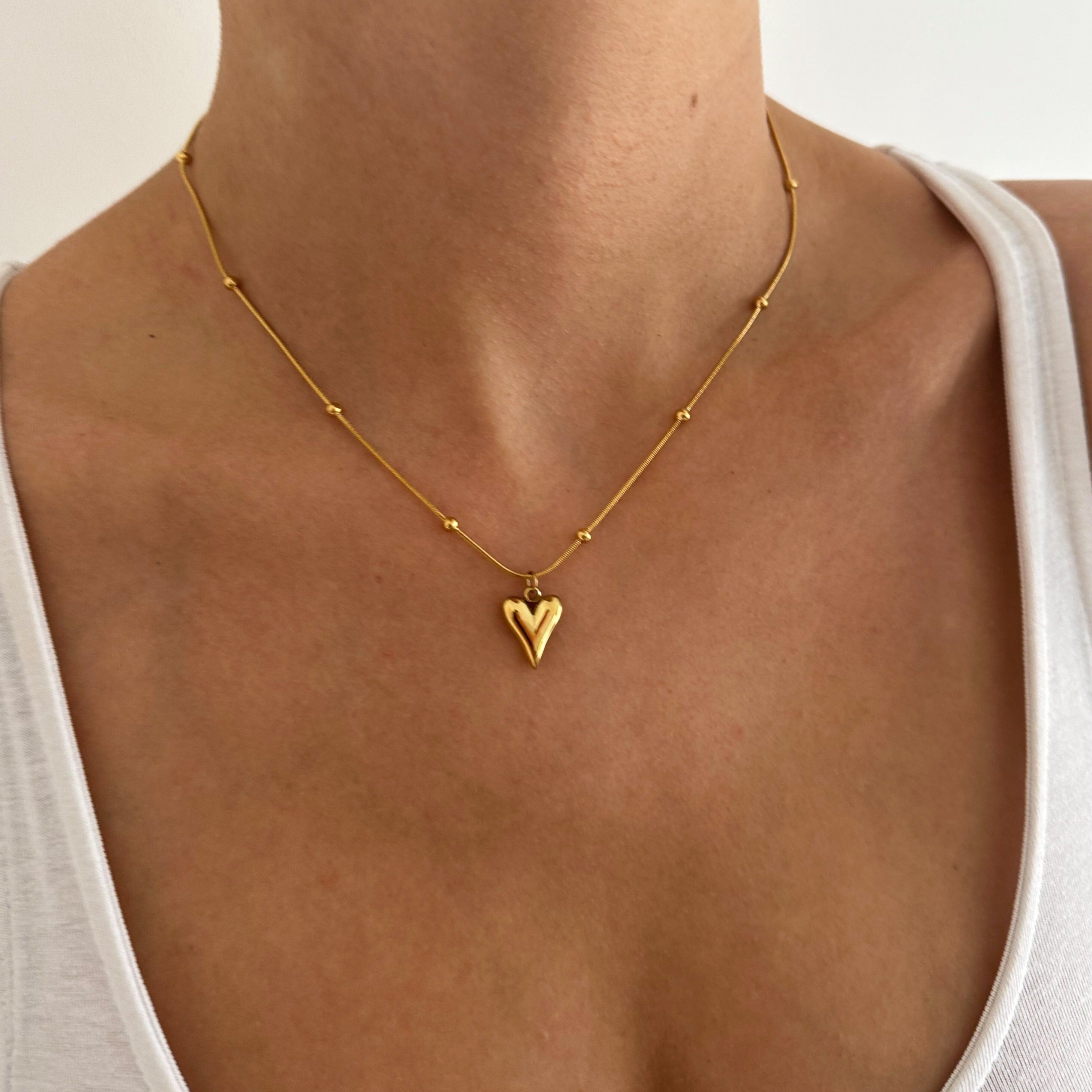 Gold Chain with Heart Statement Pendant