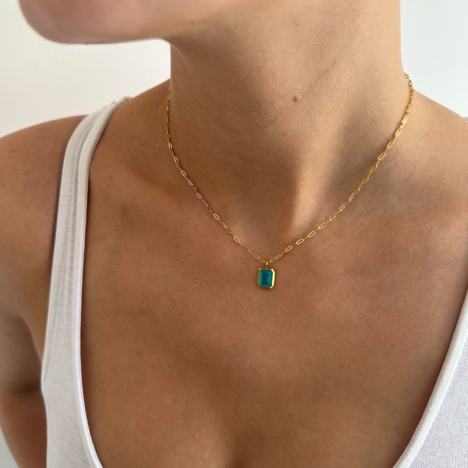 nique Blue Pendant Gold Paperclip Chain Necklace, an ideal statement piece.