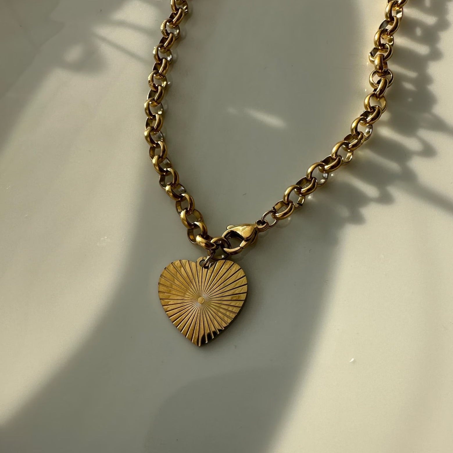 Fashionable Gold Chunky Heart Necklace enhancing any ensemble