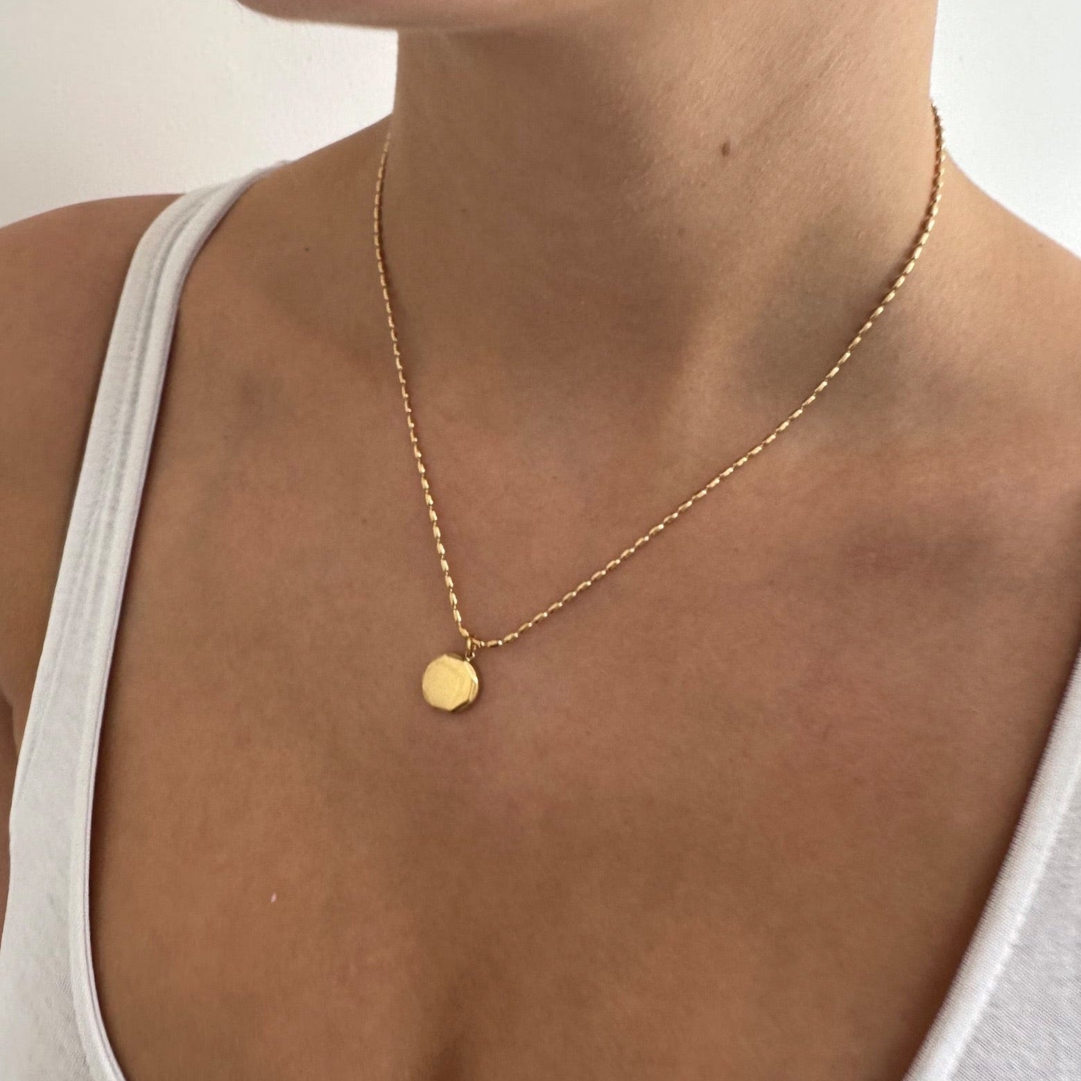Gold coin pendant necklace