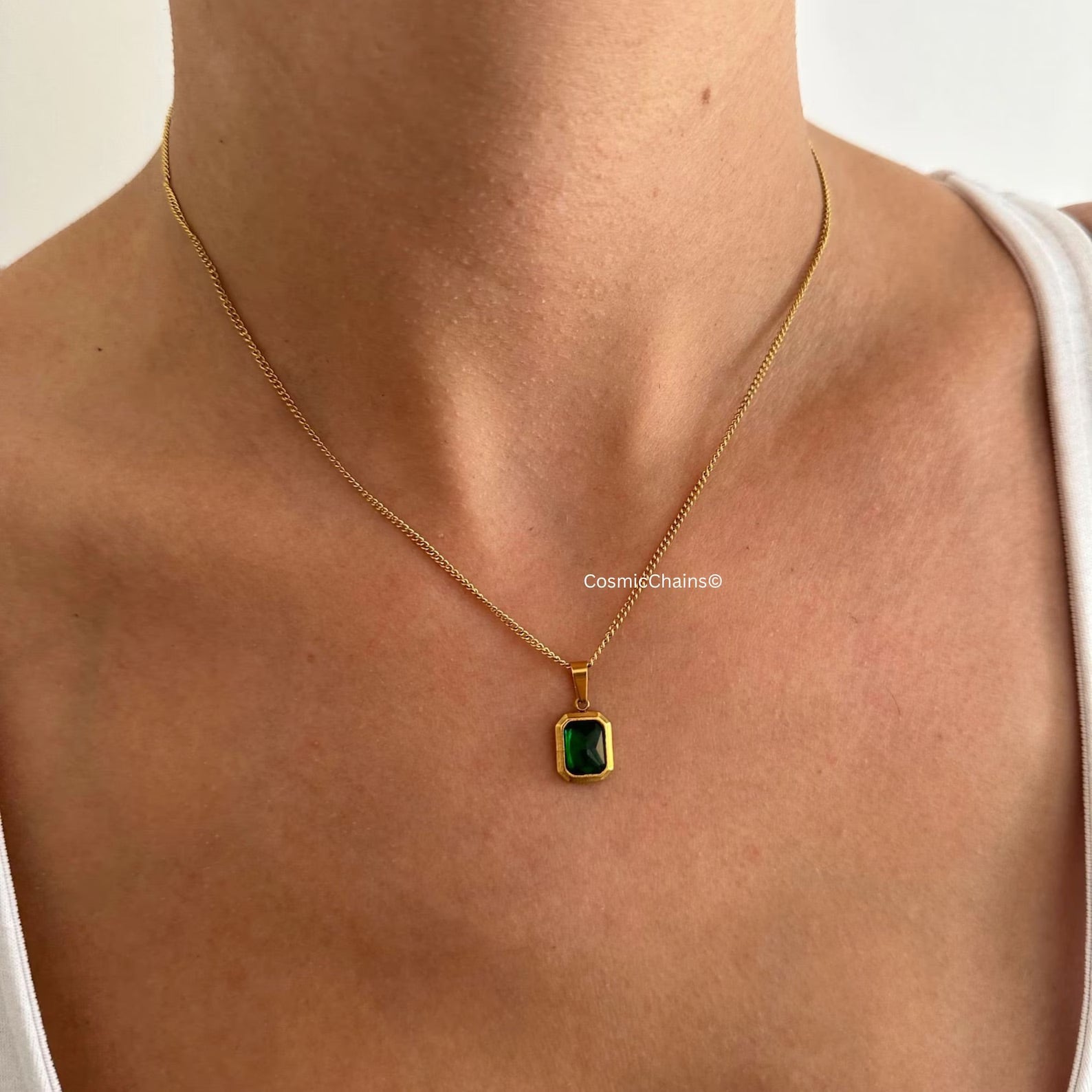 Vintage-styled Gold and Emerald Necklace, water-safe and stylish.