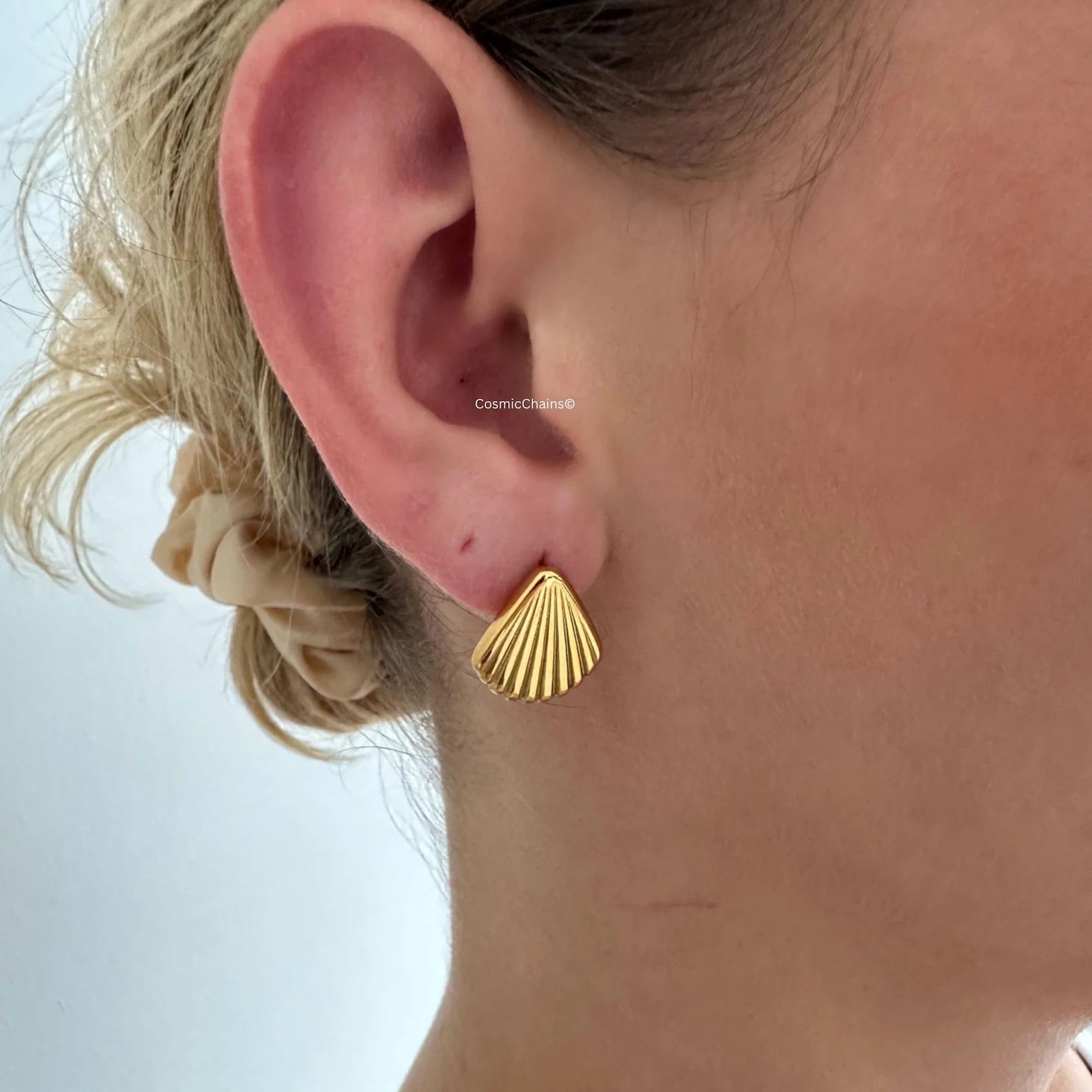 Shiny Gold Shell Earrings for a seaside statement