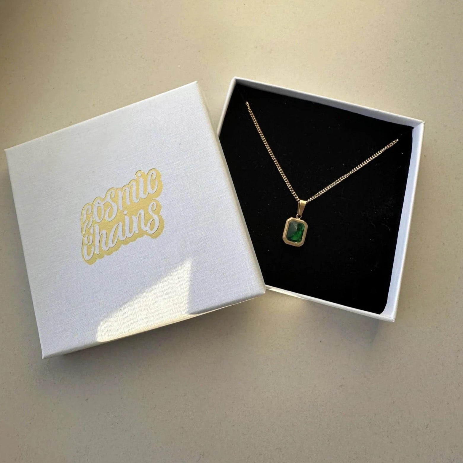 Elegant Gold and Emerald Necklace with a vintage pendant, water-safe