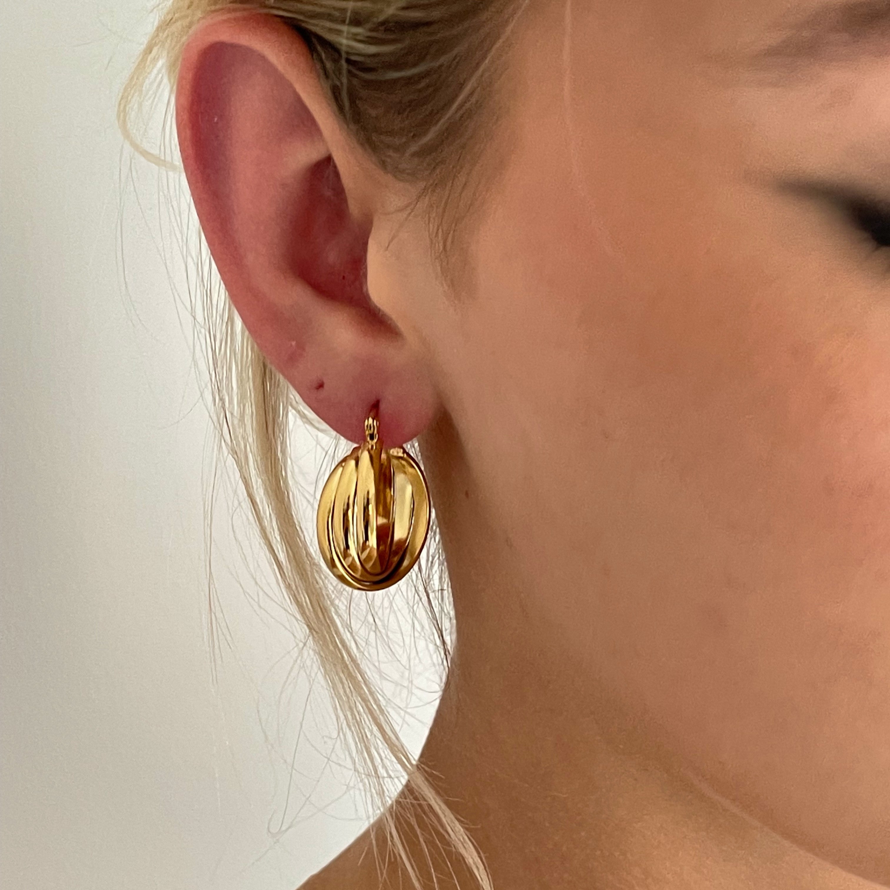 Fashion-forward Gold Twist Hoops for modern style