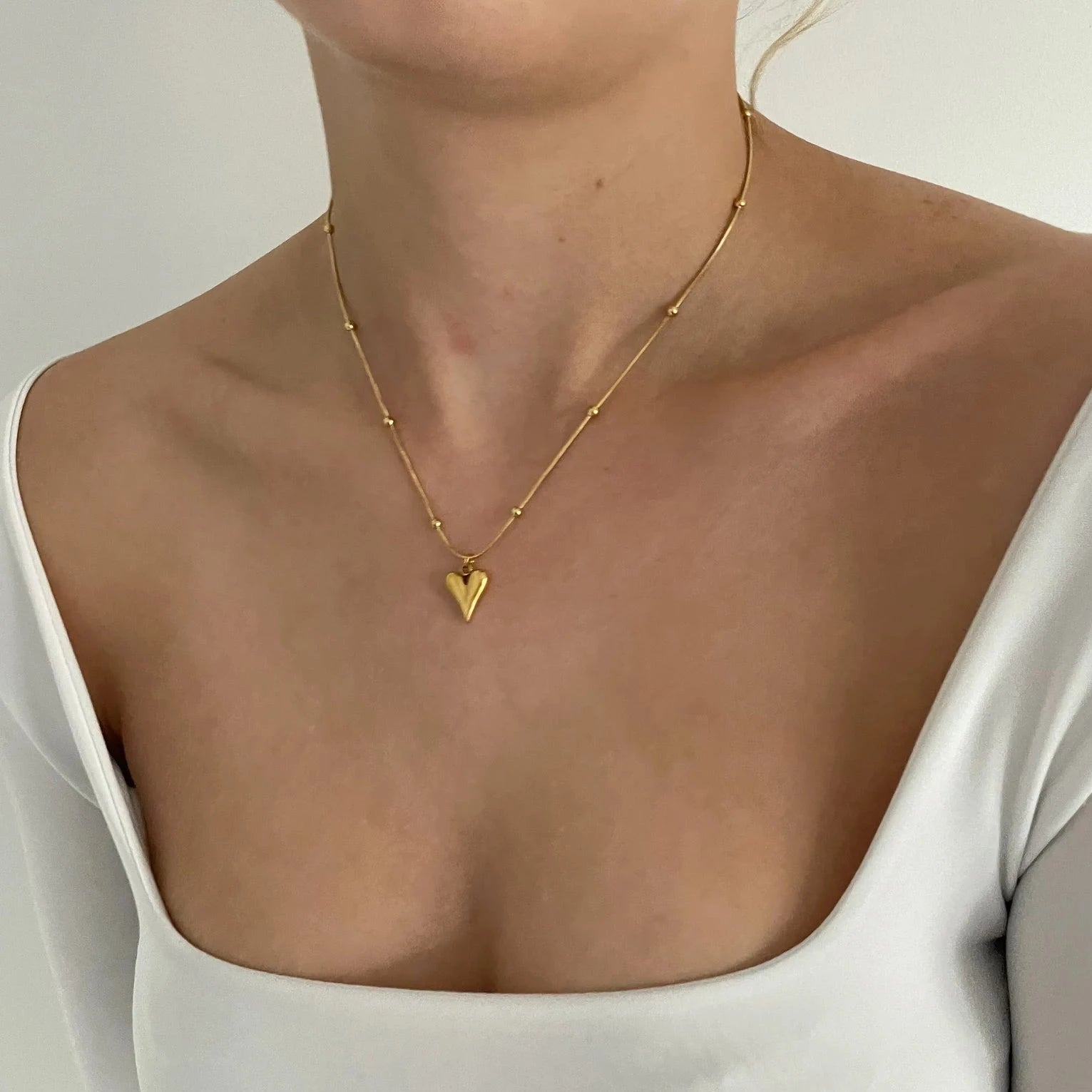 "Heart Chain Necklace - Expertly crafted with attention to detail, this necklace exudes quality craftsmanship and exquisite beauty, making it a standout accessory