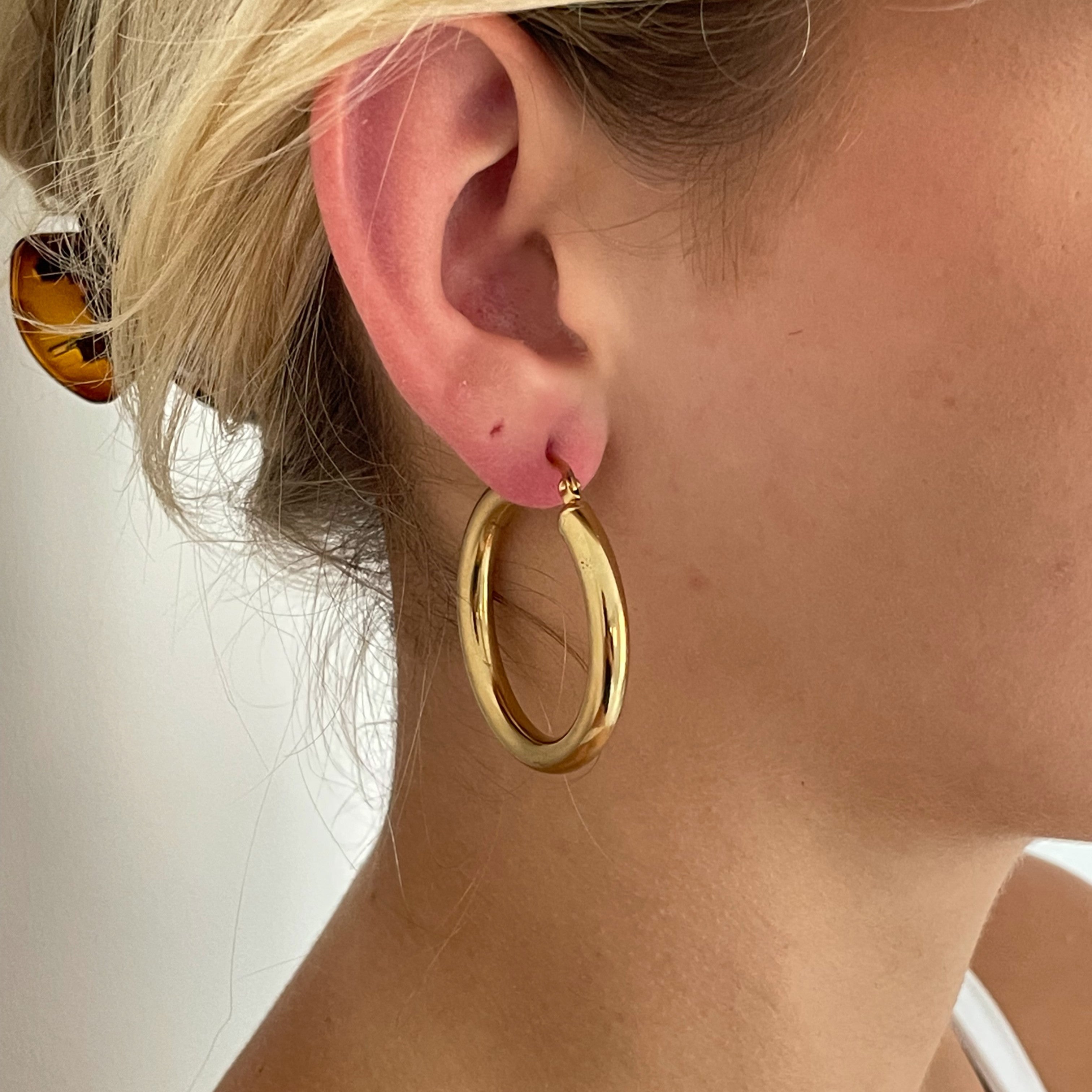 Detailed Shot of Modern Hollow Hoop Earrings
