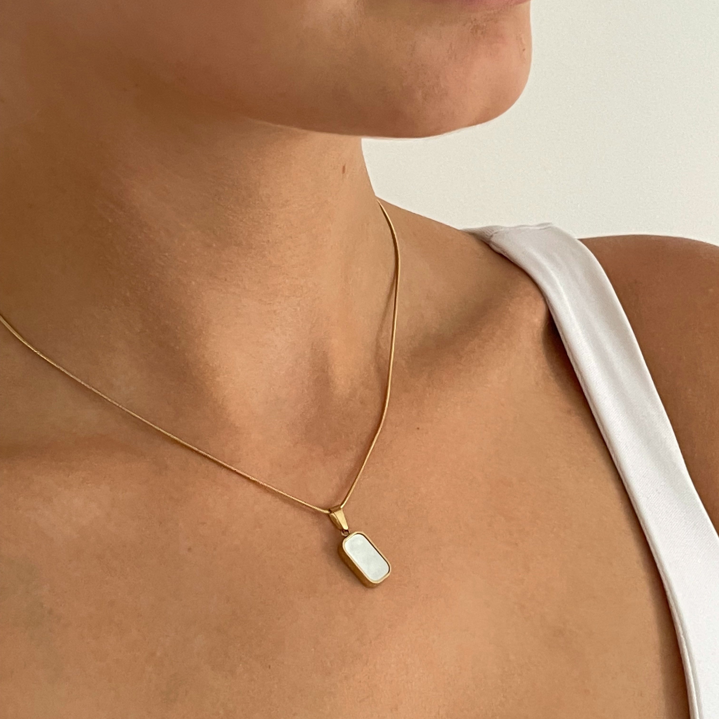Golden Glow: Enhance Your Look with a Necklace Pendant
