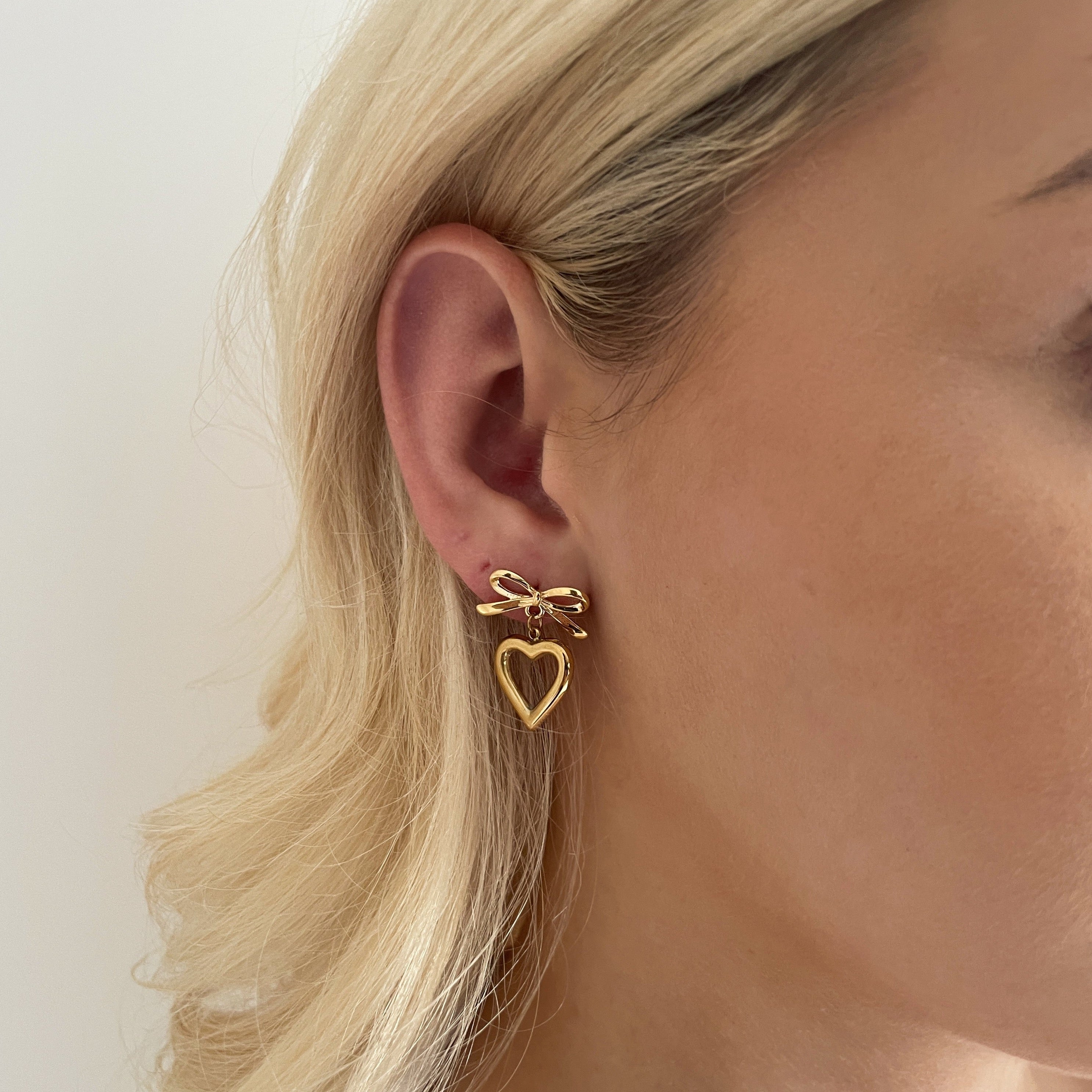 Gold Heart And Bow Earrings