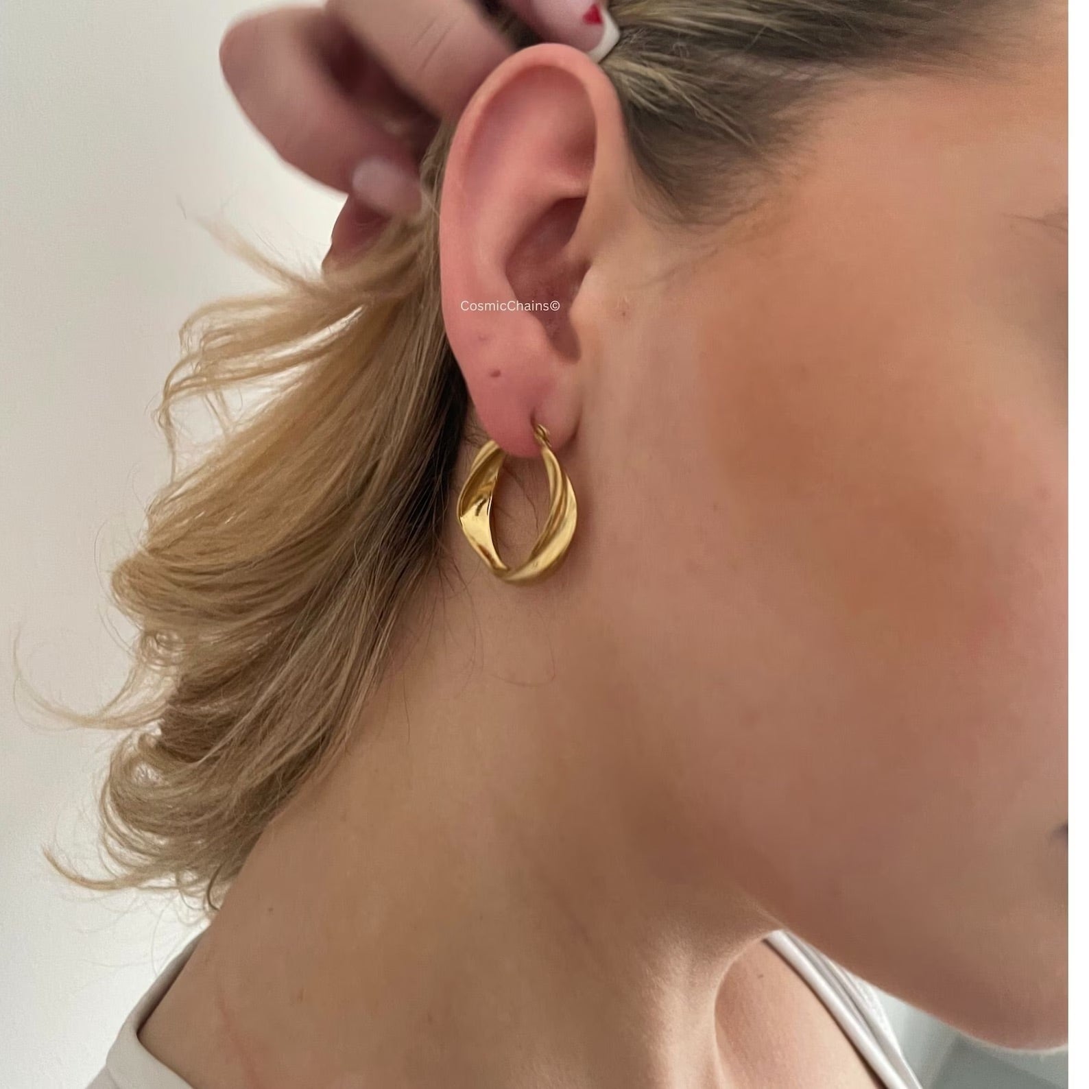Discover the allure of chunky gold hoop earrings, perfect for elevating any outfit