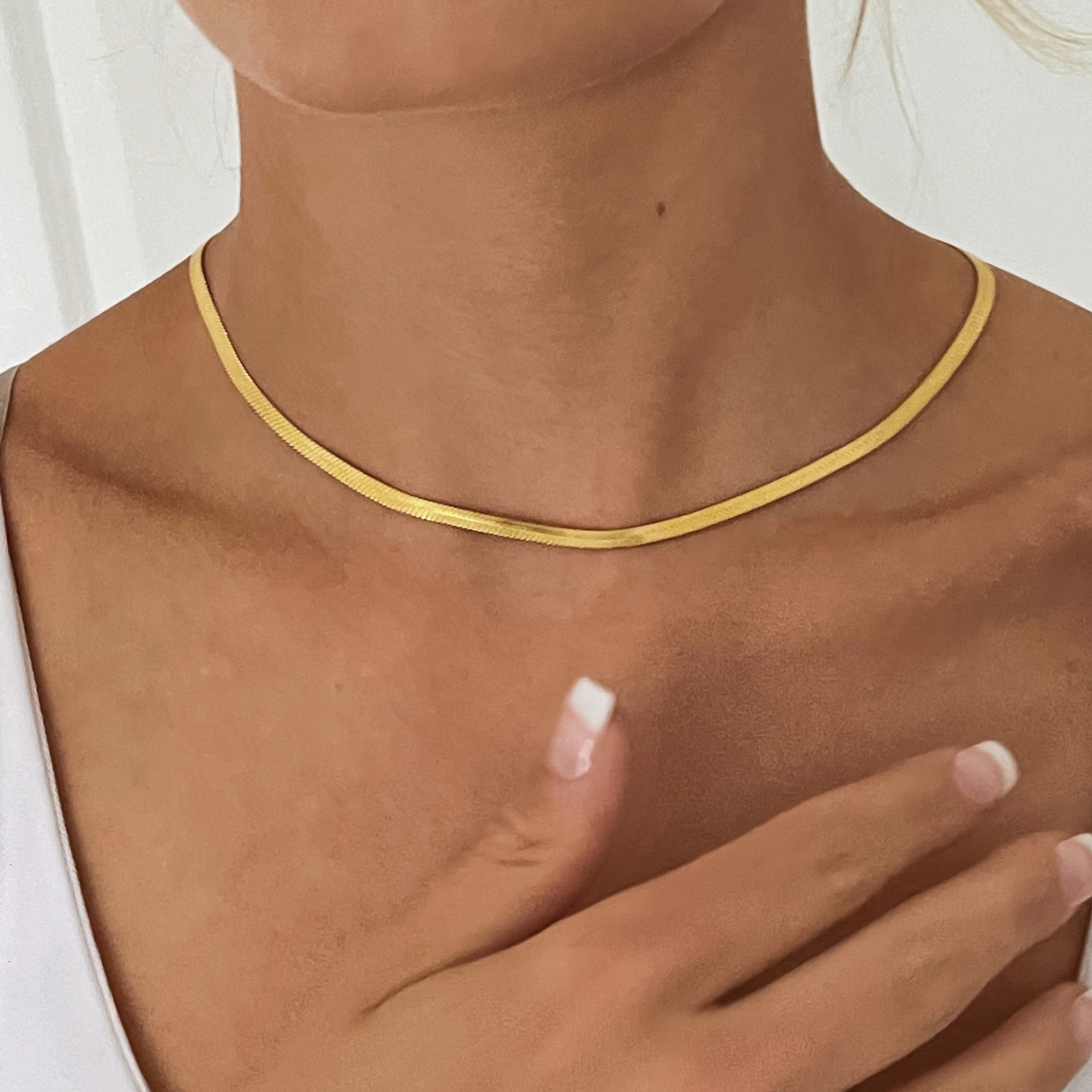 Gold Herringbone Necklace on model